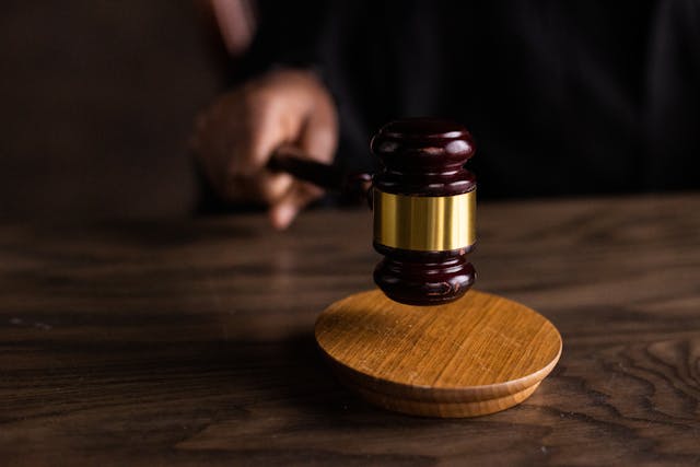 Brown gavel on table