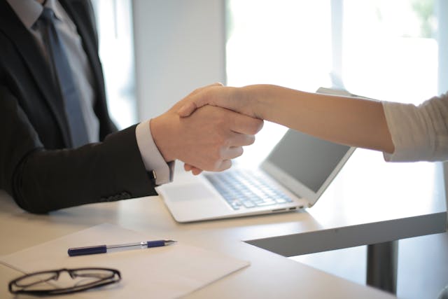 Two people shaking hands