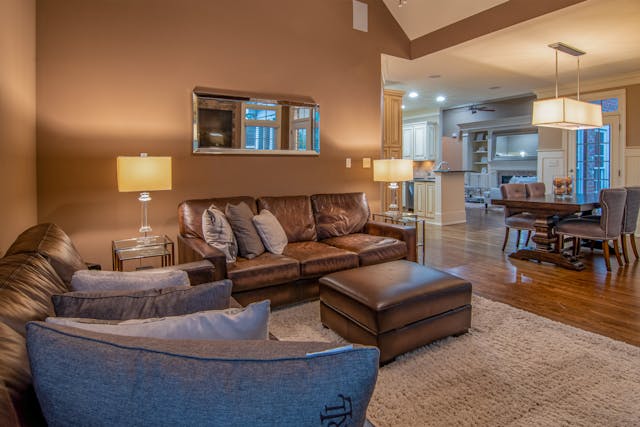 living room with two brown couches